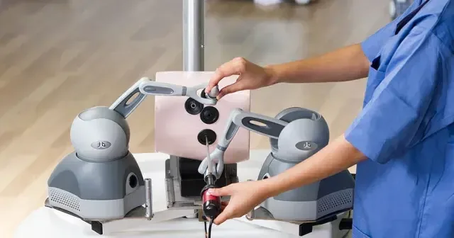 Two Phantom Touch haptic devices used in a dual-arm application