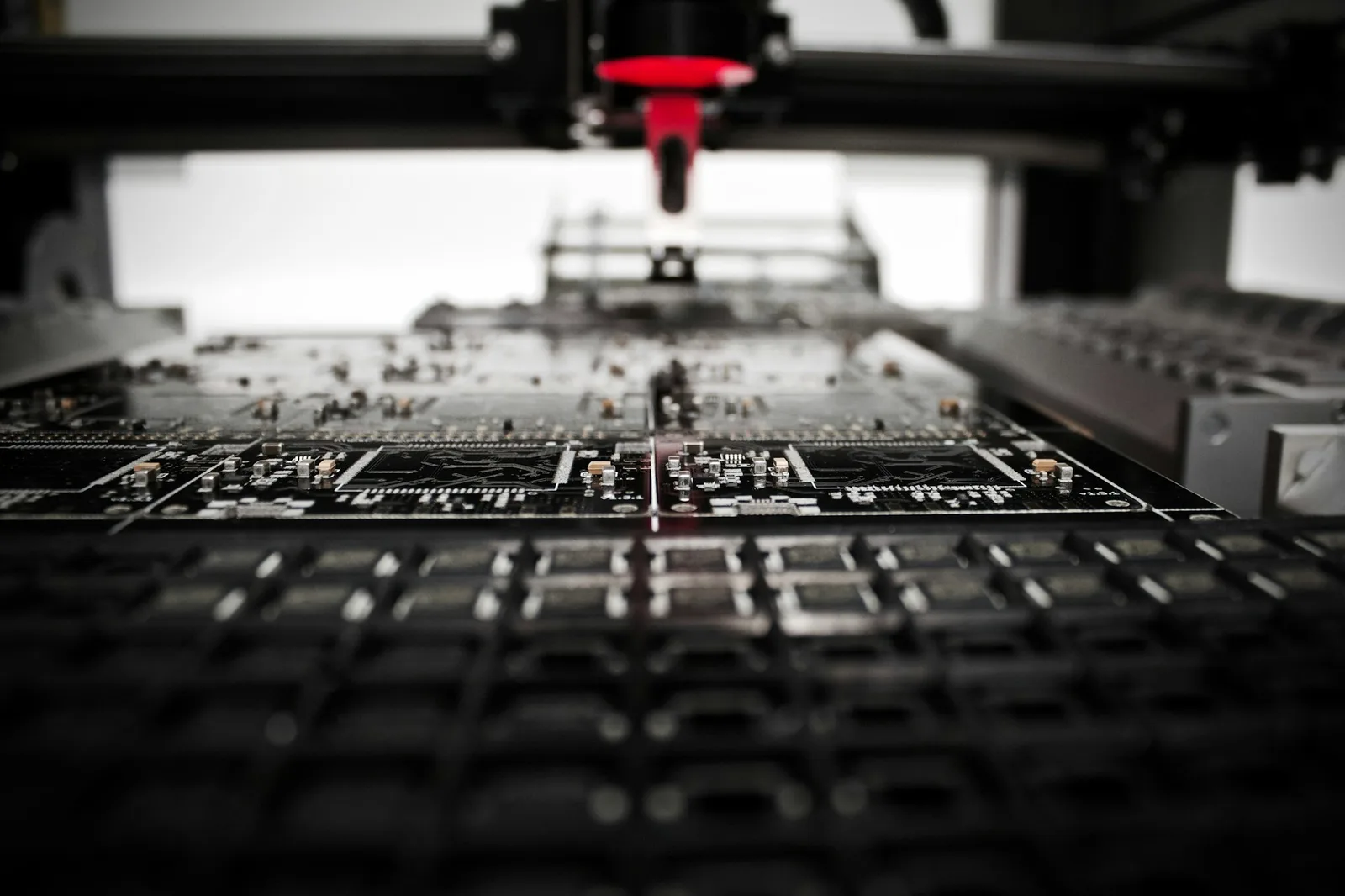 Close-up of precision electronics manufacturing equipment